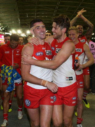 Colin O'Riordan (left) and Dane Rampe of the Swans celebrate after the Round 17 AFL match between the North Melbourne Kangaroos and the Sydney Swans at Etihad Stadium.