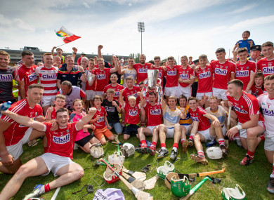 Cork players celebrate their victory.