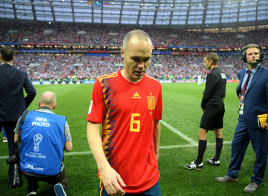 Iniesta leaves the pitch following Spain's defeat to Russia on Sunday.