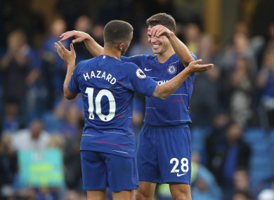 Hazard celebrates Chelsea's 3-2 win with Cesar Azpilicueta.
