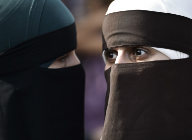 People demonstrate in Copenhagen, Denmark as the new ban on garments covering the face is implemented