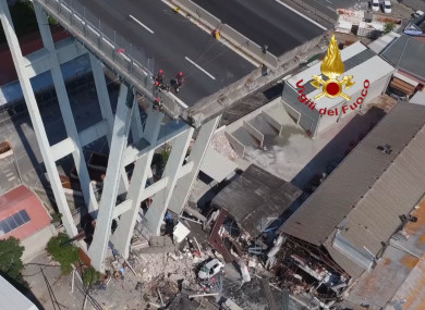 In this frame taken from a video released by the Vigili del Fuoco (Firefighters), an aerial view of the collapsed Morandi highway bridge, in Genoa.