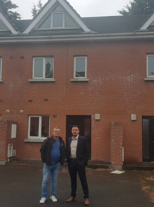 Mayor Mark Ward and local representative William Carey at the vacant houses on Station Grove.