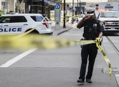 Emergency personnel and police work the scene of shooting near Fountain Square.