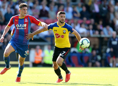 Crystal Palace's Martin Kelly (left) and Southampton's Shane Long battle for the ball.
