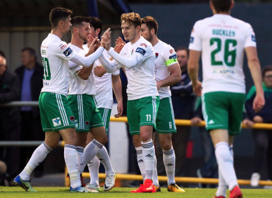 Cork's Kieran Sadlier celebrates scoring a goal with team-mates.