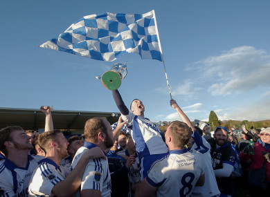 St. Patrick's Ciaran Doyle celebrates with the trophy