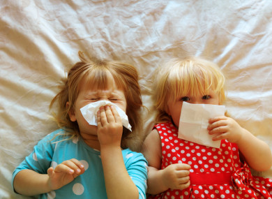 File photo of children blowing their noses