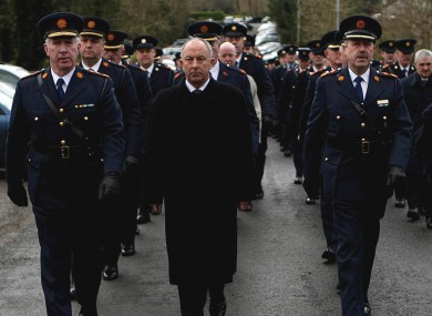 Outgoing Garda commissoner Fachtna Murphy, justice minister Dermot Ahern, and Deputy and incoming Garda Commissioner Martin Callinan.