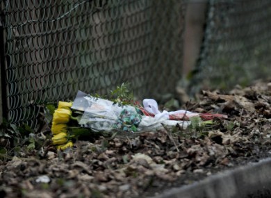 A bouquet of flowers left by the family of Joanna Yeates at Longwood Lane, close to Bristol and Clifton Golf Club, where her body was found.