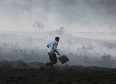 Coilte firefighter Vincent McAndrew battles a gorse fire outside Pontoon in County Mayo over the weekend.