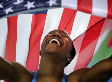 The USA's Carmelita Jeter celebrates winning the Women's 100m Final in Daegu yesterday.
