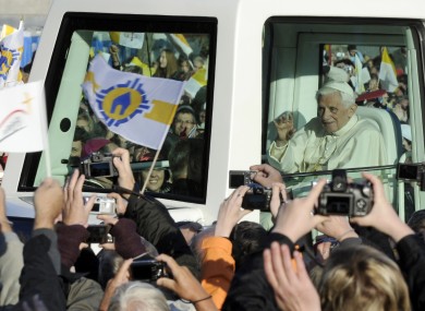 Pope Benedict XVI arrives in his popemobile to celebrate an open air mass in front of the St Mary's cathedral in Erfurt, central Germany, today.