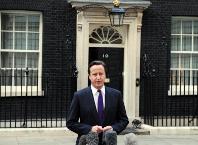 British PM David Cameron speaking to the media outside Downing Street today.