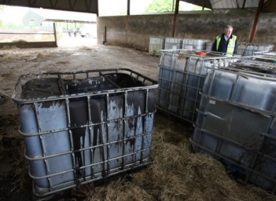 Containers of sludge at a fuel laundering plant. File photo.
