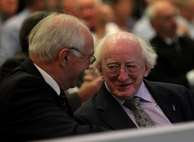 Michael D. Higgins (right) chats with former FAI President David Blood at this year's FAI AGM in Ennis.