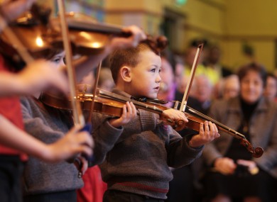 Children at St Agnes' Primary School perform for President Michael D Higgins today