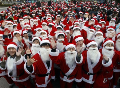 But which is the real Santa? 1,000 volunteers donned costumes to deliver gifts to the poor in South Korea