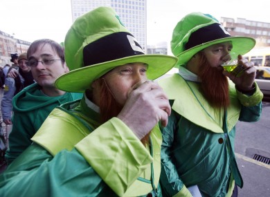 Leprechauns drinking something green and possibly alcoholic