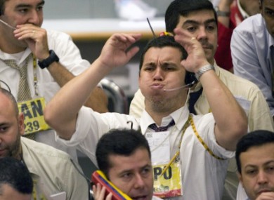 File photo of traders in Sao Paulo.