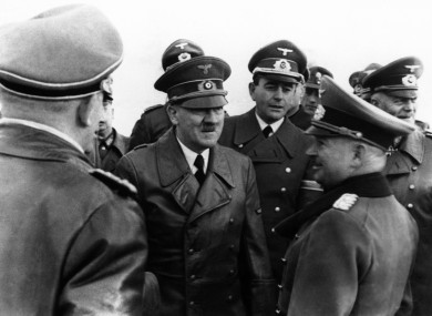 Adolf Hitler, centre, during a military review in April 1944.