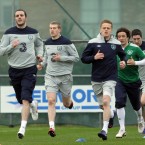 John O'Shea and Damien Duff lead the warm-up.<span class=