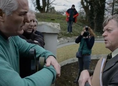 Ben Gilroy, from Freedom From All Debt, and Pat Dunne, the deputy sheriff, argue outside the home in Laois during the first unsuccessful eviction attempt