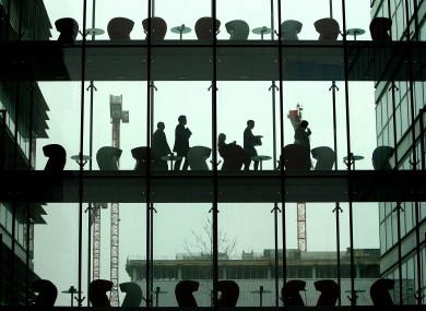 Financial services workers at the IFSC: the financial services sector is likely to create 10,000 jobs in the next three years, according to a new survey of foreign investors.