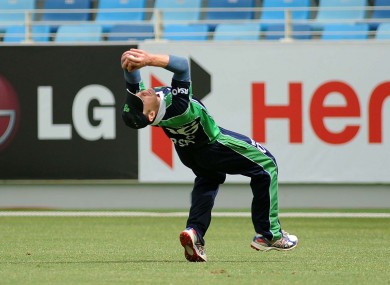 William Porterfield makes a catch to dismiss Stephen Myburgh of The Netherlands.