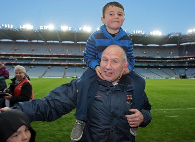 Glenn Ryan celebrates with his son.