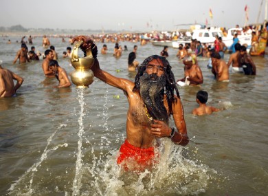 Hindu devotees at the Sangam, where the Rivers Ganges, Yamuna and the mythical Saraswati meet.