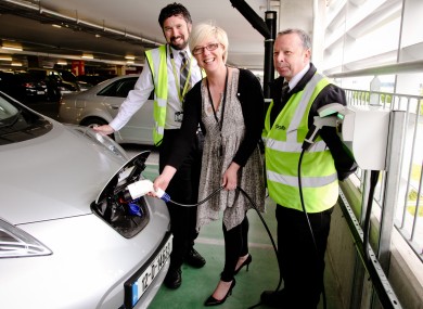 Valerie Singleton, DAA Landside Facilities Manager, tops up the first electric car at the new charging points with DAA car park co-ordinators Padraig Lavin and Pat O’Keeffe.
