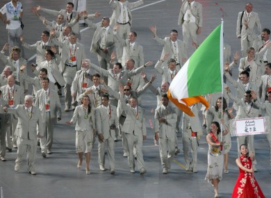 Ciara Peelo leads the Irish team around Beijing's Olympic Stadium.