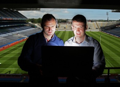 Armagh legend Steven McDonnell and Cork hurling goalkeeper Donal Og Cusack tune in at Croke Park yesterday.