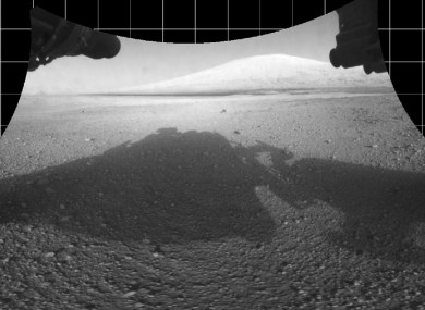 Curiosity captures its own shadow in photo from Mars showing the view from beneath the rover.