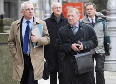 Irish Aid officials arrive at Leinster House to answer questions from the Committee on Foreign Affiars and Trade relating to the misappropriation of funds.