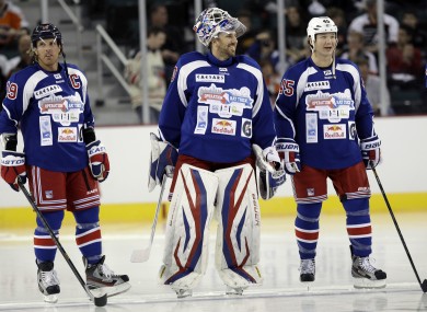 Brad Richards (left) lines up with Henrik Lundqvist and Aaron Asham.
