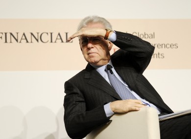 Italian premier Mario Monti at a meeting in Milan today