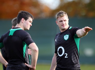 JJamie Heaslip (right) gives directions to Jonny Sexton.