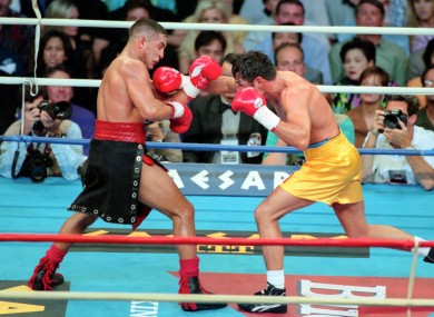 Hector Camacho, left, fights Oscar De La Hoya in Las Vegas in 1997.