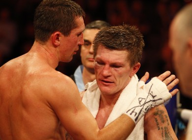 Ricky Hatton (centre) is consoled by winner Vyacheslav Senchenko.
