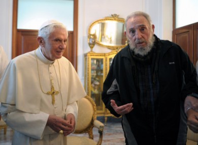 Pope Benedict XVI meets with Fidel Castro hanging in Havana last March.