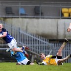 Cavans Cian Mackey is taken down by Antrim goalkeeper Chris Kerr for a Cavan penalty. Pic: INPHO/Presseye/John McIlwaine