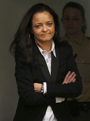 Beate Zschaepe, member of the neo-Nazi group National Socialist Underground (NSU) enters the court room before the start of her trial in Munich, southern Germany, Monday, May 6, 2013.