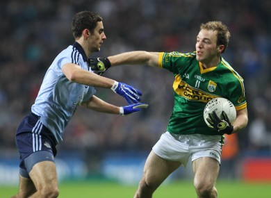 Dublin's James McCarthy tackles Darran O'Sullivan of Kerry.