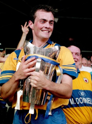 Clare captain Anthony Daly with the Liam MacCarthy trophy after breaking the curse of Biddy Early.