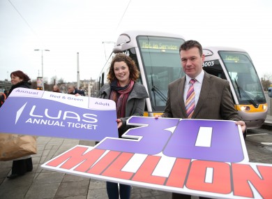 Minister Alan Kelly (right) with the 30 millionth Luas passenger this year, Rachel Williams.