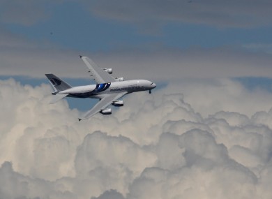 A Malaysia Airlines Airbus performing a flypast in 2012.
