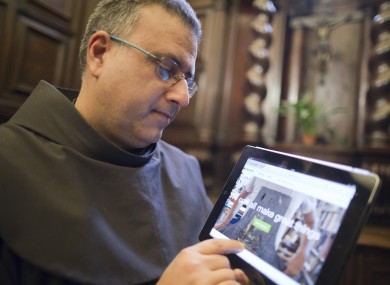 Friar Stefano Tamburo checks the Kickstarter page.