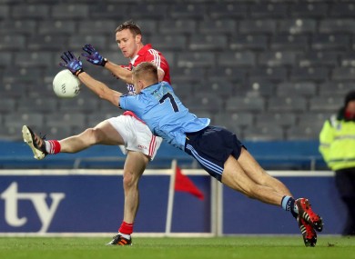 Cork's John Hayes and Dublin's Johnny Cooper.